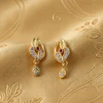 Classic Gold Finish Earrings with Crystal Detailing & Red Stone - Image 4